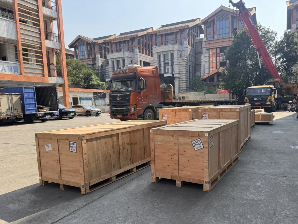 George Group export packing with room-labeled crates for overseas project installation